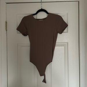 Light brown women’s bodysuit from Aritzia